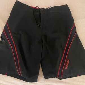 O'Neill Black Board Shorts with Red Trim